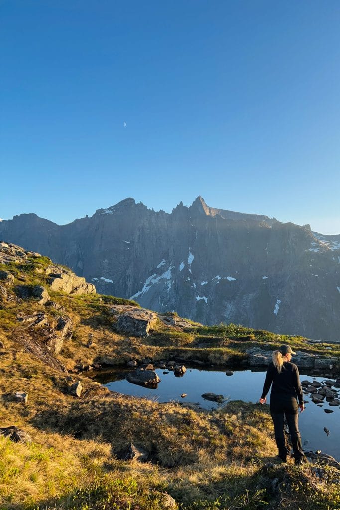 Woman overlooking a mountain landscape in Norway