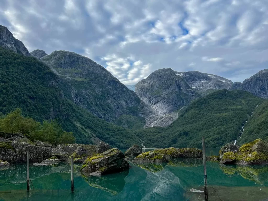Bondhusvatnet lake surrounded by steep mountains in Hardanger, Norway