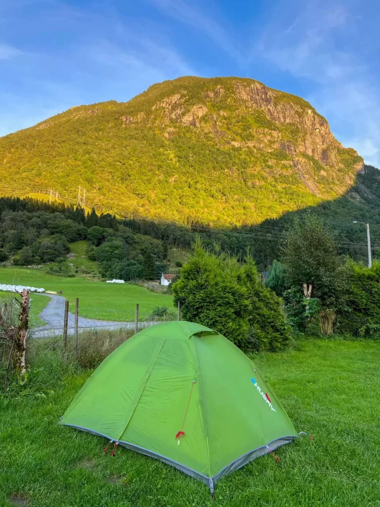 Tent pitched in Sundal beneath the mountains of Hardanger